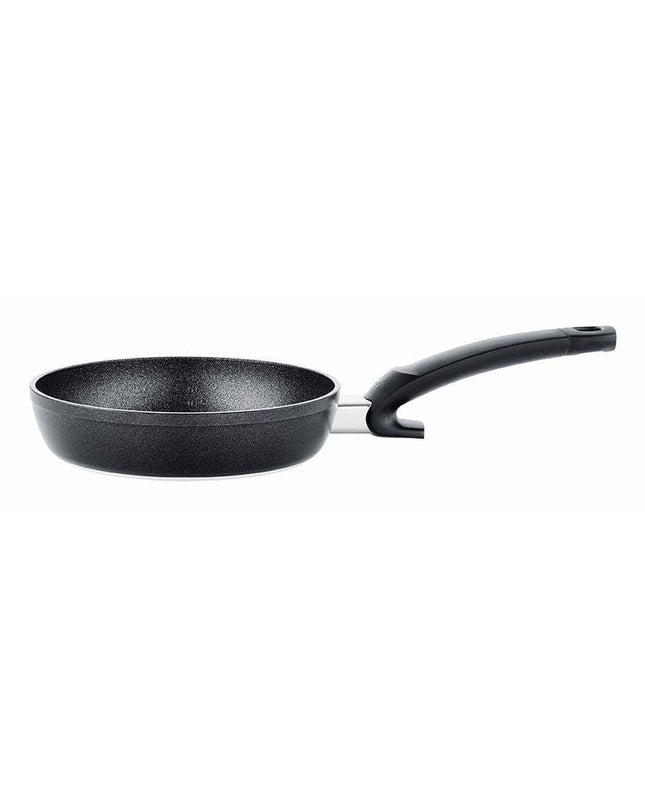 Fissler Pan 15910524100/0 in black aluminum, 24 cm diameter, suitable for home cooking and kitchen use.