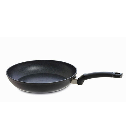 Fissler ADAMAT CLASSIC black aluminium cookware pan for home cooking, with a sturdy handle and non-stick interior.