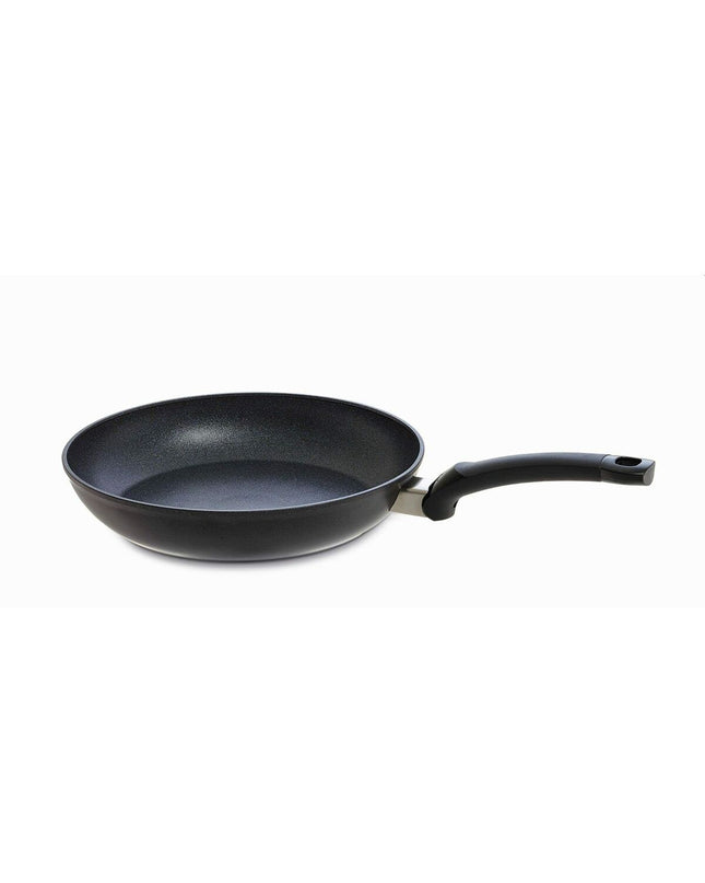 Fissler ADAMAT CLASSIC black aluminium cookware pan for home cooking, with a sturdy handle and non-stick interior.