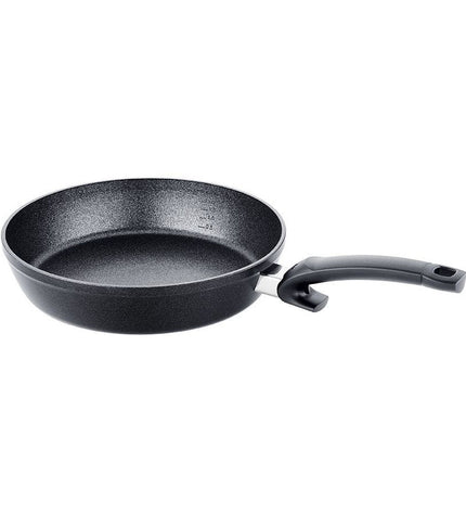 Fissler black aluminum frying pan with 28 cm diameter, suitable for home cooking and kitchen use.