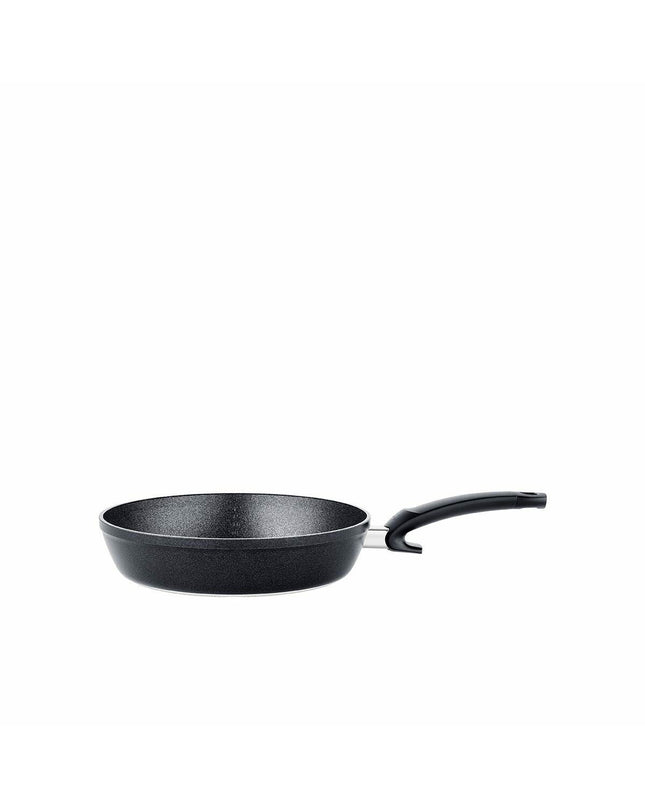 Fissler 28cm black aluminum frying pan for home cooking, with a sturdy handle and non-stick surface.