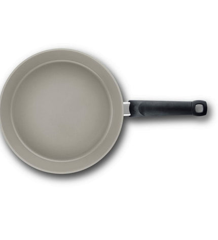 Fissler aluminium cookware pan in grey metal, ideal for home cooking, with a sturdy handle and non-stick interior.