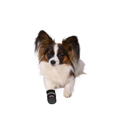Trixie Walker Care Comfort black dog shoes for paw protection and comfort, shown on a dog with adjustable straps.