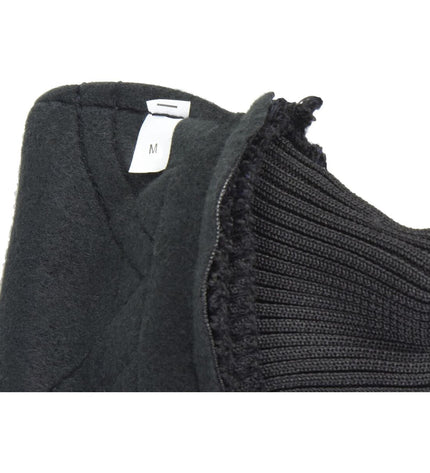 Black Trixie Walker Care Comfort dog shoes, durable and protective footwear for dogs, shown on a brown dog.