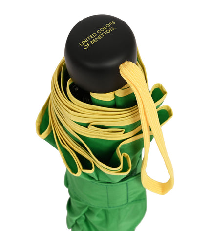 Benetton green foldable umbrella with 94 cm diameter, designed for travel and luggage, open showing the canopy and handle.