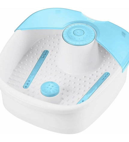 Medisana voetmassager for health and wellness, showing the device with control buttons and foot massage rollers.