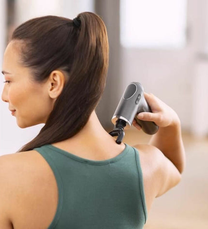 Medisana 88999 massage gun for muscles, in black, with ergonomic handle and attachment head for targeted muscle relief.