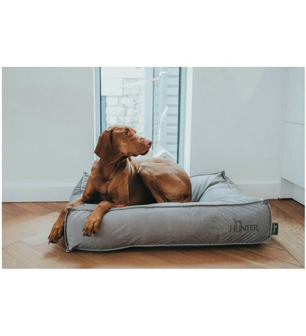 Gray Hunter Lancaster dog bed in 120x90 cm with soft fabric and raised edges, designed for comfort and support for dogs.