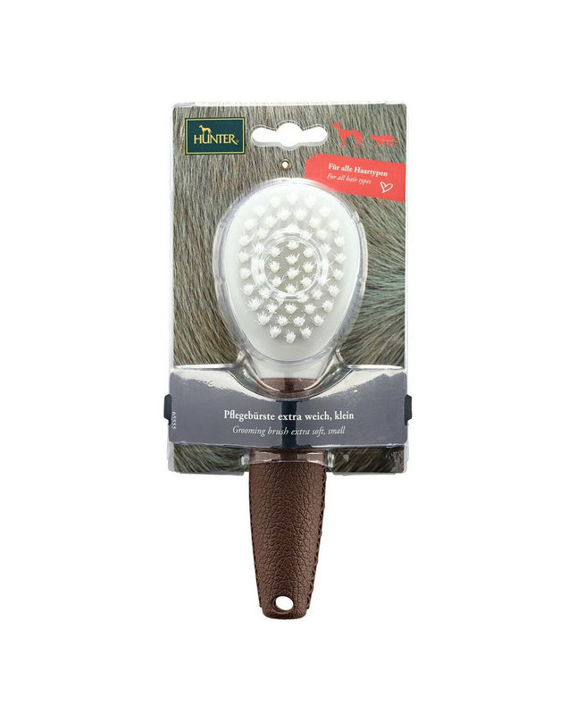Hunter Extra Soft dog brush with ergonomic handle, designed for gentle grooming and detangling of furry coats.
