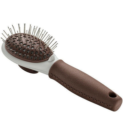 Hunter self-cleaning dog hairbrush with ergonomic handle and stainless steel bristles, designed for easy grooming of dogs.