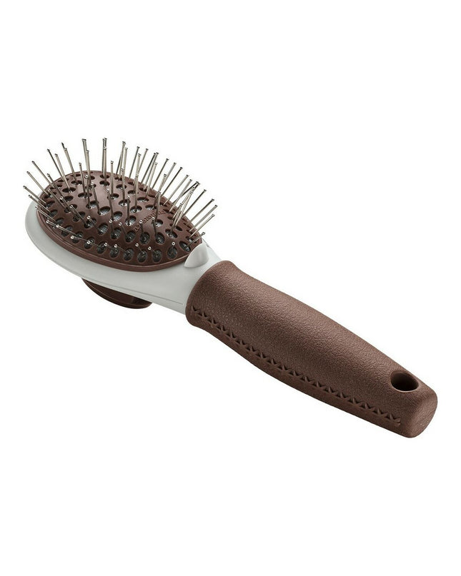 Hunter self-cleaning dog hairbrush with ergonomic handle and stainless steel bristles, designed for easy grooming of dogs.