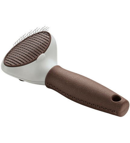 Hunter Zelfreinigend hondenborstel with ergonomic handle, designed for easy grooming and shedding control in dog grooming.