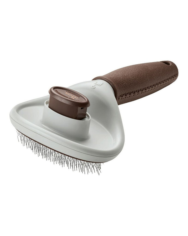 Hunter Dematteerkam for dogs, pet grooming brush with ergonomic handle, shown on a clean surface.