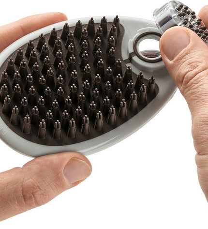 Hunter hondenkam and shampoo set for dogs, showing grooming tools and bottles of Hunter dog shampoo on a clean surface.