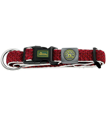 Red Hunter Plus Draad dog collar for large dogs, showing sturdy nylon material and metal buckle on a red background.