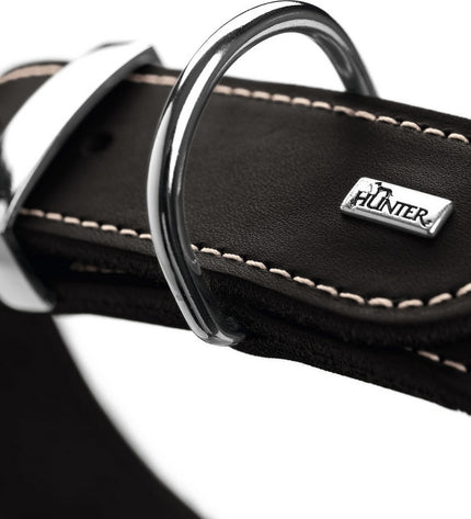 Black Hunter Aalborg dog collar for 30-38 cm necks, made of durable material, shown on a dog in a natural setting.