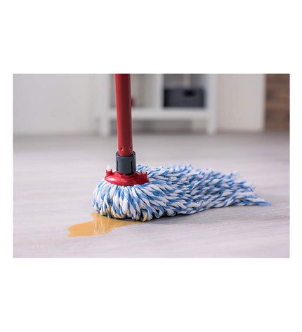 Vileda white cotton mop for household cleaning, with absorbent cotton strands and sturdy handle for effective dirt removal.