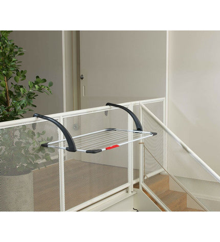 Vileda 157229 Sunset outdoor clothes drying rack in white steel with 10-meter line, suitable for balcony laundry drying.