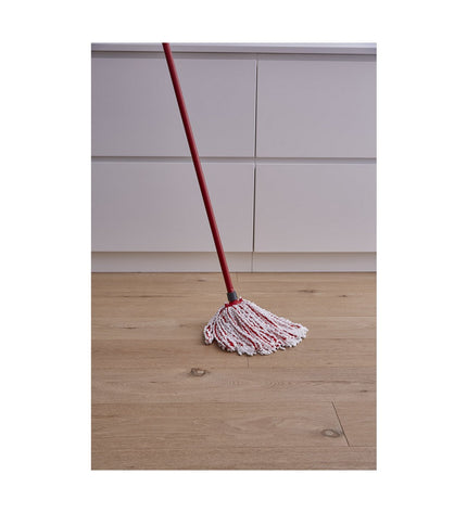 White Vileda microfiber floor mop for household cleaning, designed for effective dirt and dust removal on floors.