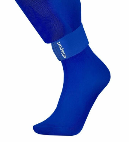 Blue Uhlsport football shin guard holder for sport and outdoor use, one size, shown with adjustable straps.