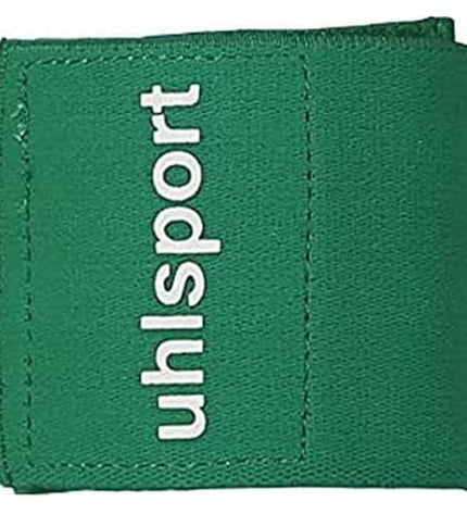 Green Uhlsport football shin guards with fastening straps, designed for sport and outdoor soccer protection.