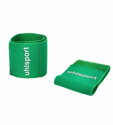 Green Uhlsport football shin guards with fastening support, designed for sports and outdoor football activities.