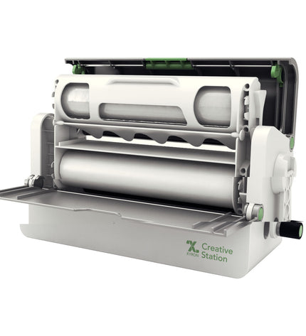 Xyron Lamineerapparaat for office use, compact office electronics and stationery device with clear lamination area.