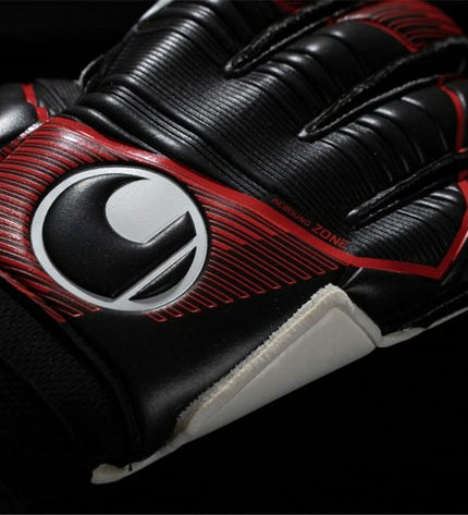 Black Uhlsport Powerline Soft Flex goalkeeper gloves for adults, designed for football and outdoor sports.