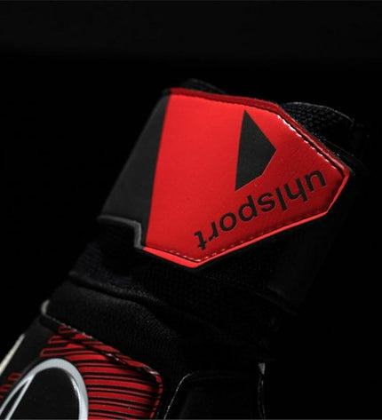 Black Uhlsport Powerline Soft Flex goalkeeper gloves for adults, designed for football and outdoor sports.