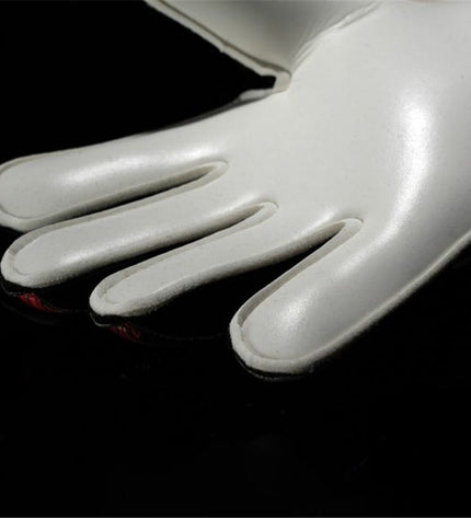Black Uhlsport Powerline Starter Soft goalkeeper gloves for soccer, featuring padding and grip for outdoor football matches.