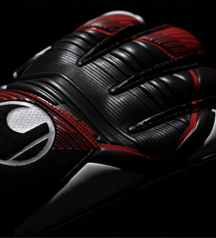 Black Uhlsport Powerline Starter Soft goalkeeper gloves for football, with padded palms and wrist support.