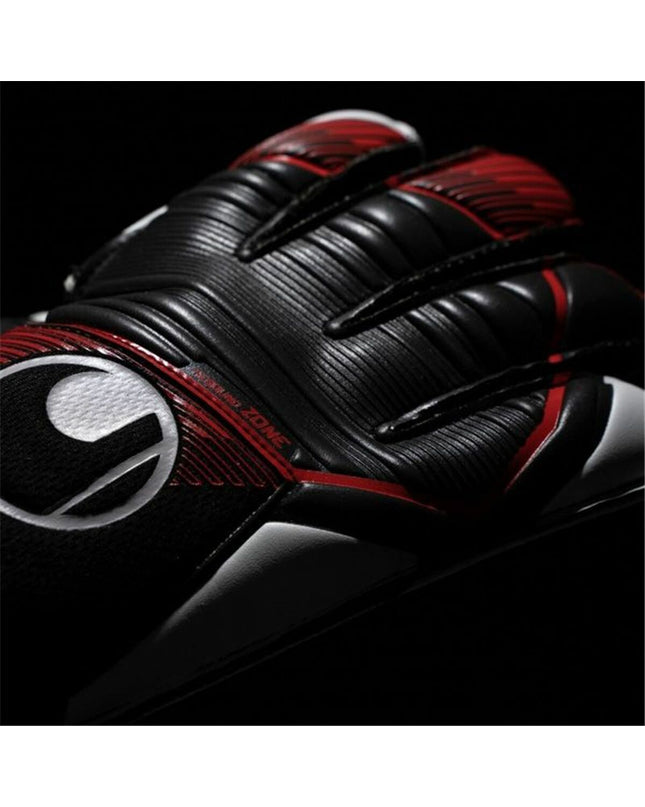 Black Uhlsport Powerline Starter Soft goalkeeper gloves for football, with padded palms and wrist support.
