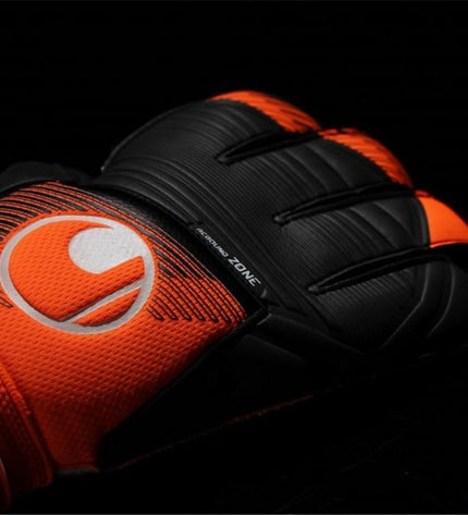 Orange Uhlsport Keeperhandschoenen Soft Ressist+ for adults, designed for football goalkeeping, with padded palms and secure fit.