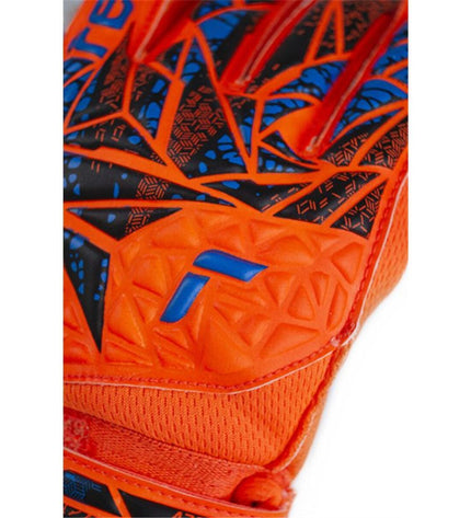 Reusch Attrakt Solid orange goalkeeper gloves for soccer, sport and outdoor use, with padded palms and secure wrist straps.