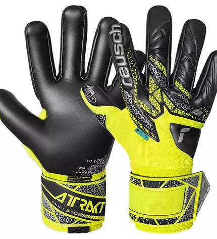 Reusch Attrakt Gold X Nc goalkeeper gloves in black for adults, designed for football and outdoor sports.
