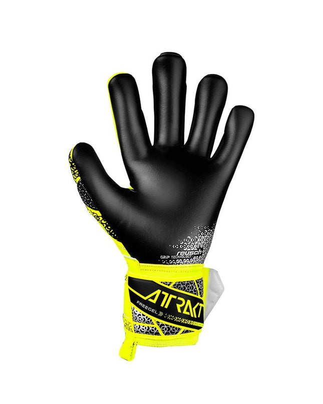 Reusch Attrakt Freegel yellow goalkeeper gloves for adults, designed for football, with textured palm and adjustable wrist strap.