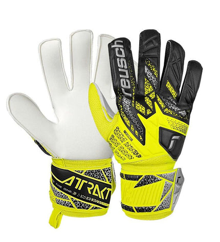 Reusch Attrakt Solid yellow goalkeeper gloves for adults, designed for safe and secure football play, outdoor sports gear.