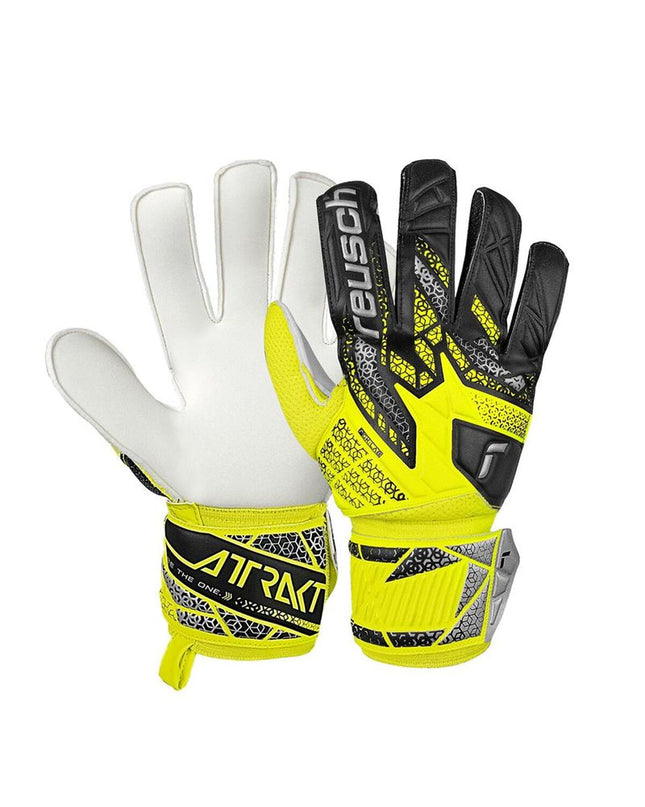 Reusch Attrakt Solid yellow goalkeeper gloves for adults, designed for safe and secure football play, outdoor sports gear.