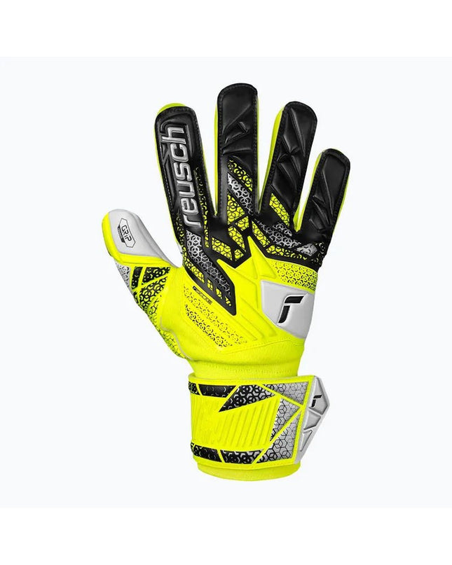 Reusch Attrakt Grip yellow goalkeeper gloves for adults, designed for safe and secure grip in soccer and outdoor sports.