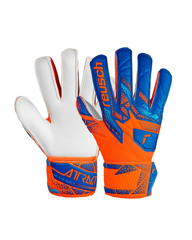 Reusch Attrakt Solid orange goalkeeper gloves for football, sporty outdoor design with padded palms and secure wrist closure