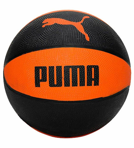 Puma indoor basketball in black and orange with textured surface, designed for sport and outdoor play.