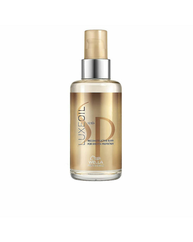 System Professional Sp Luxe Oil multivitamin treatment bottle, 100 ml, for health and personal care with nourishing formula.