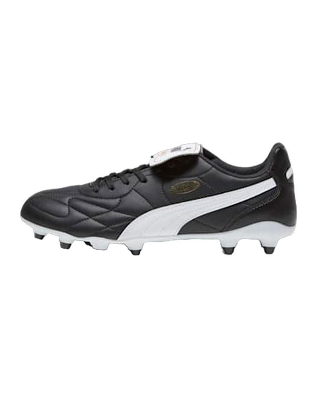 Puma King Top FG/AG adult football shoes with black and white design, suitable for outdoor and artificial turf playing surfaces.