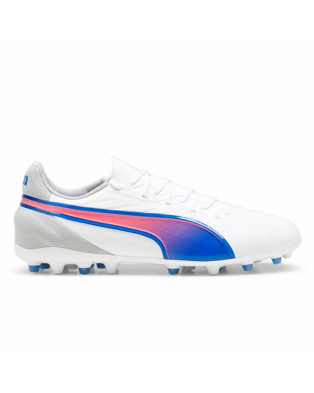 White Puma King Match MG soccer cleats for adults, sport and outdoor football shoes with studded outsole and Puma branding.