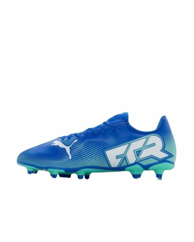 Blue Puma Future 7 Play MG adult football shoes designed for outdoor soccer, featuring a sleek sporty style and durable grip.
