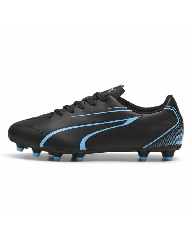 Adult Puma Vitoria football shoes for outdoor sports, showing black and white design with Puma logo on the side.