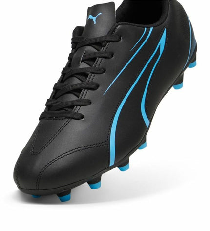 Puma Vitoria adult football shoes for outdoor soccer, black with white accents, designed for sport and outdoor use.
