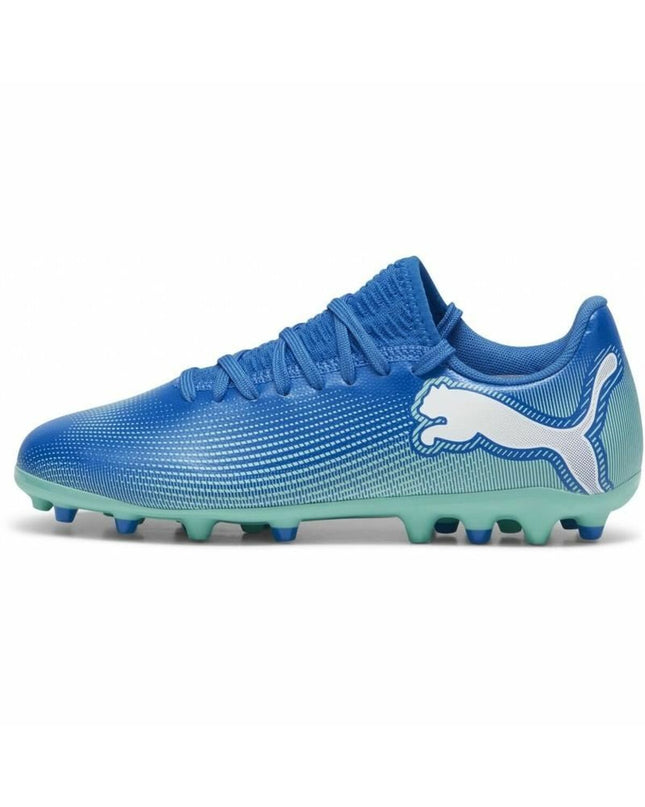 Blue Puma Future 7 Play Mg kids' football shoes, sport and outdoor footwear, showing side view with laces and sole details.