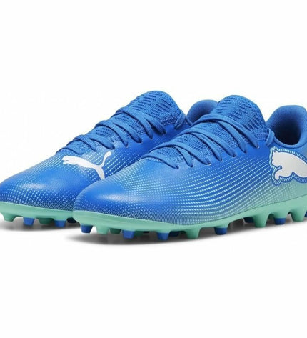 Puma Future 7 Play Mg blue football shoes for kids, designed for outdoor soccer with a sporty, supportive fit.
