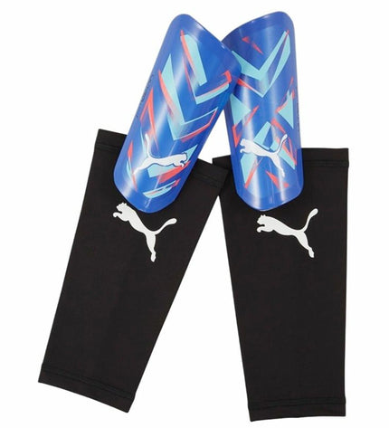 Blue Puma Ultra Light Sleeve football shin guards with padded design, suitable for sport and outdoor soccer activities.